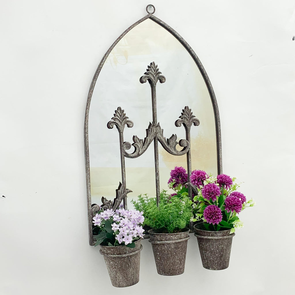 Arched metal wall mirror with triple planters, gray finish, with purple and pink flowers