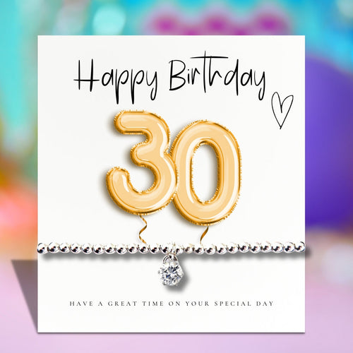 Happy Birthday 30 greeting card with gold 30 balloon and heart charm bracelet
