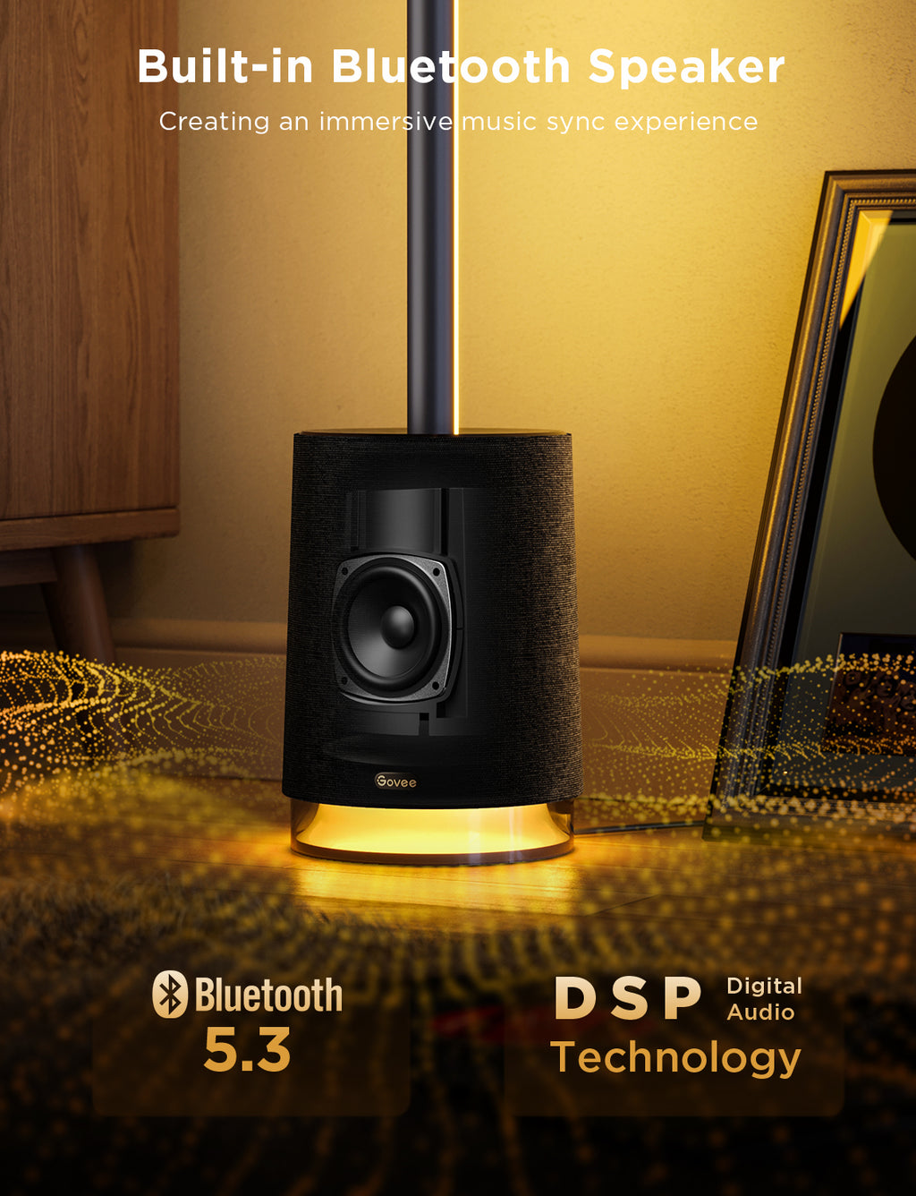 Black Bluetooth speaker with woofer and fabric cover on RGB floor lamp stand