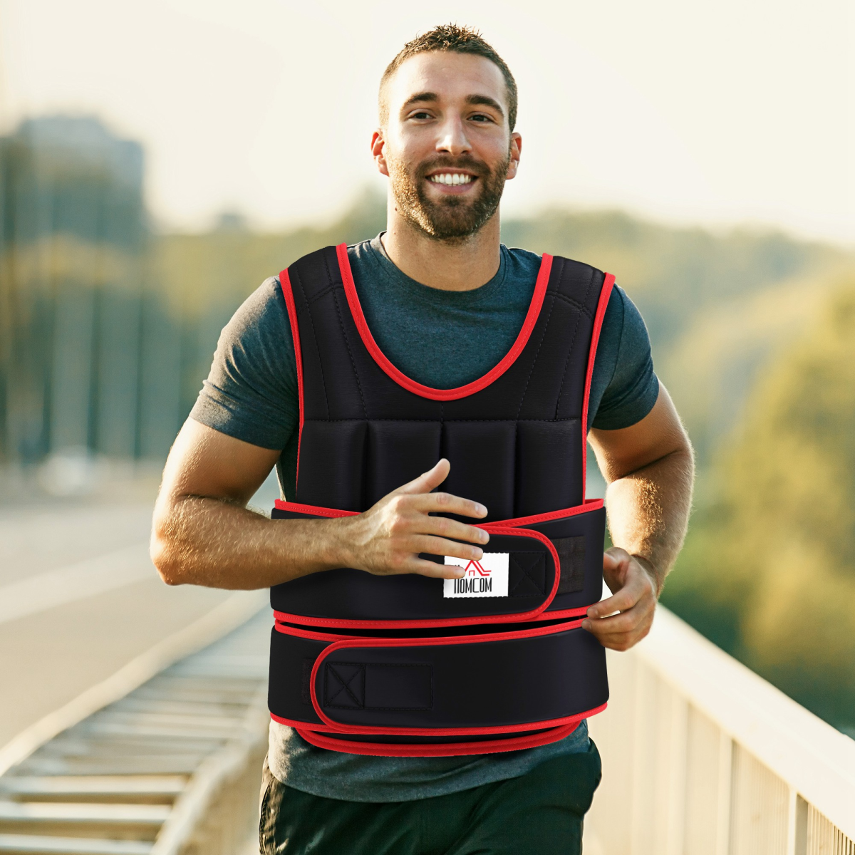 Black weighted vest with red trim worn over a short-sleeve shirt, front panel visible
