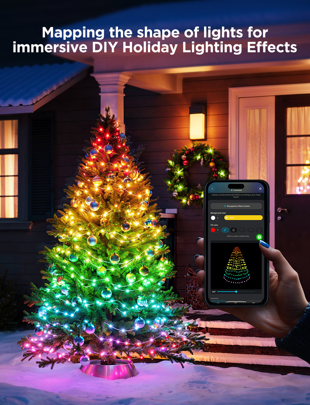 Multicolor Christmas string lights on a tree with app-controlled smart phone