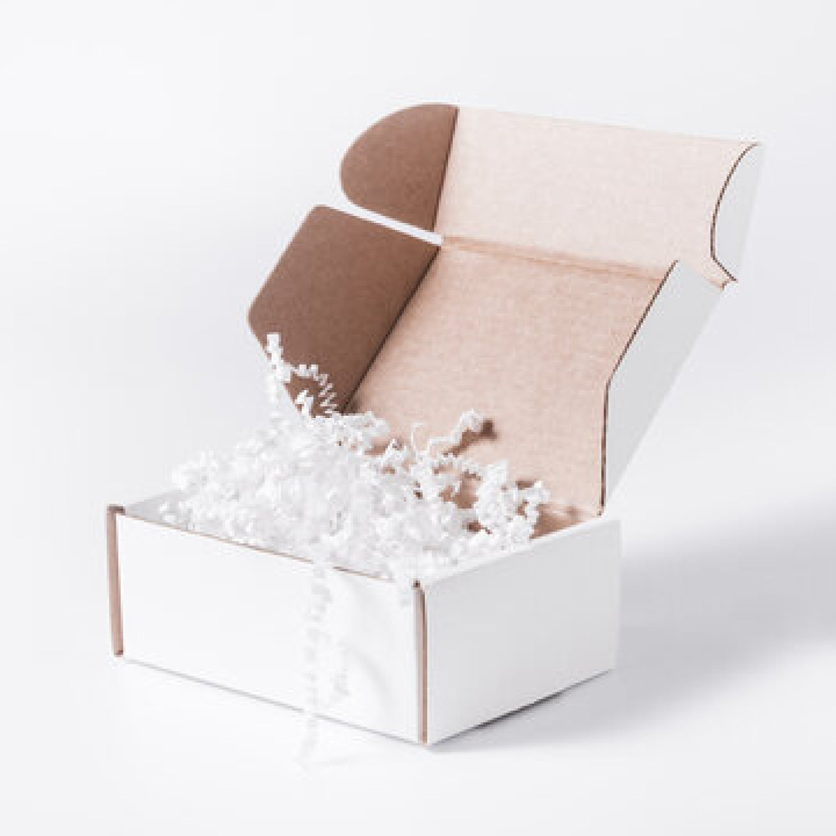 Gift set box with shredded paper filler