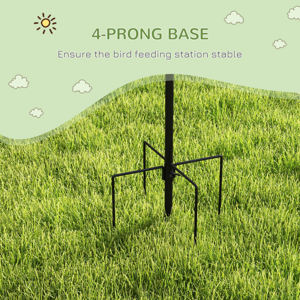 Black 4-prong base for bird feeding station, standing on grass