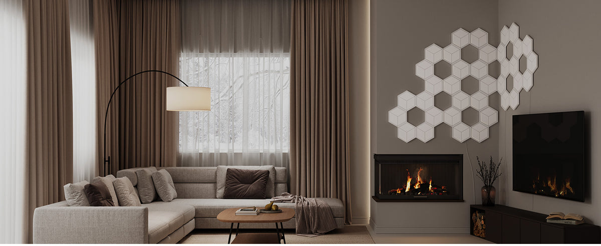 Cluster of white hexagon LED light panels on wall near fireplace with warm glow