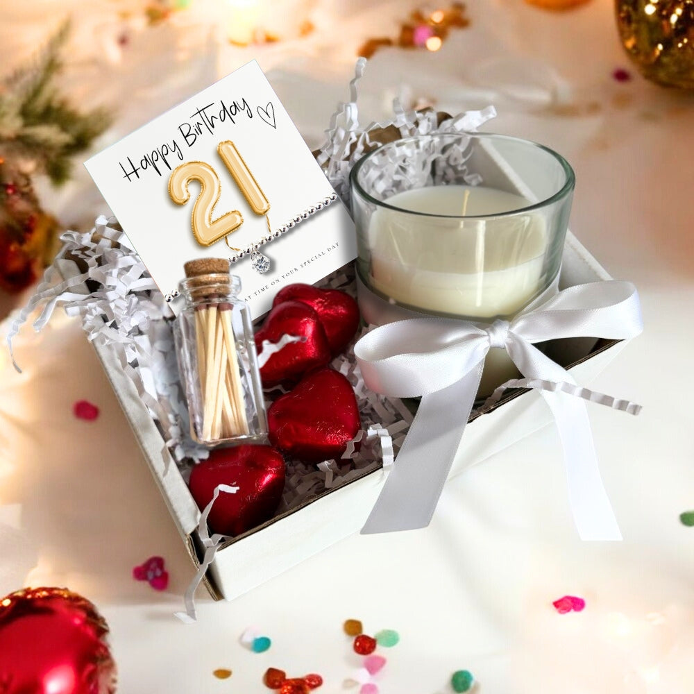 21st birthday gift hamper with greeting card, bracelet, candle, and red heart chocolates