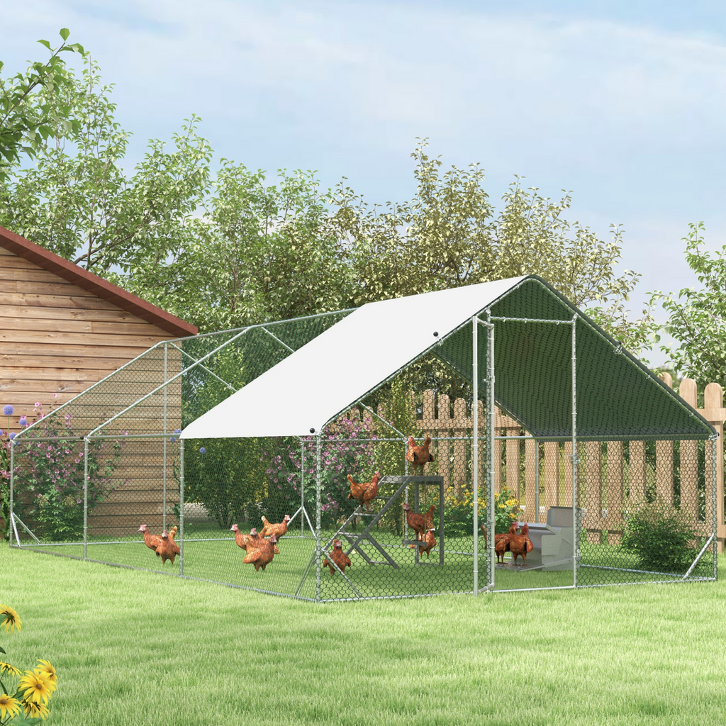 Outdoor chicken coop run with mesh sides and green-roof shelter