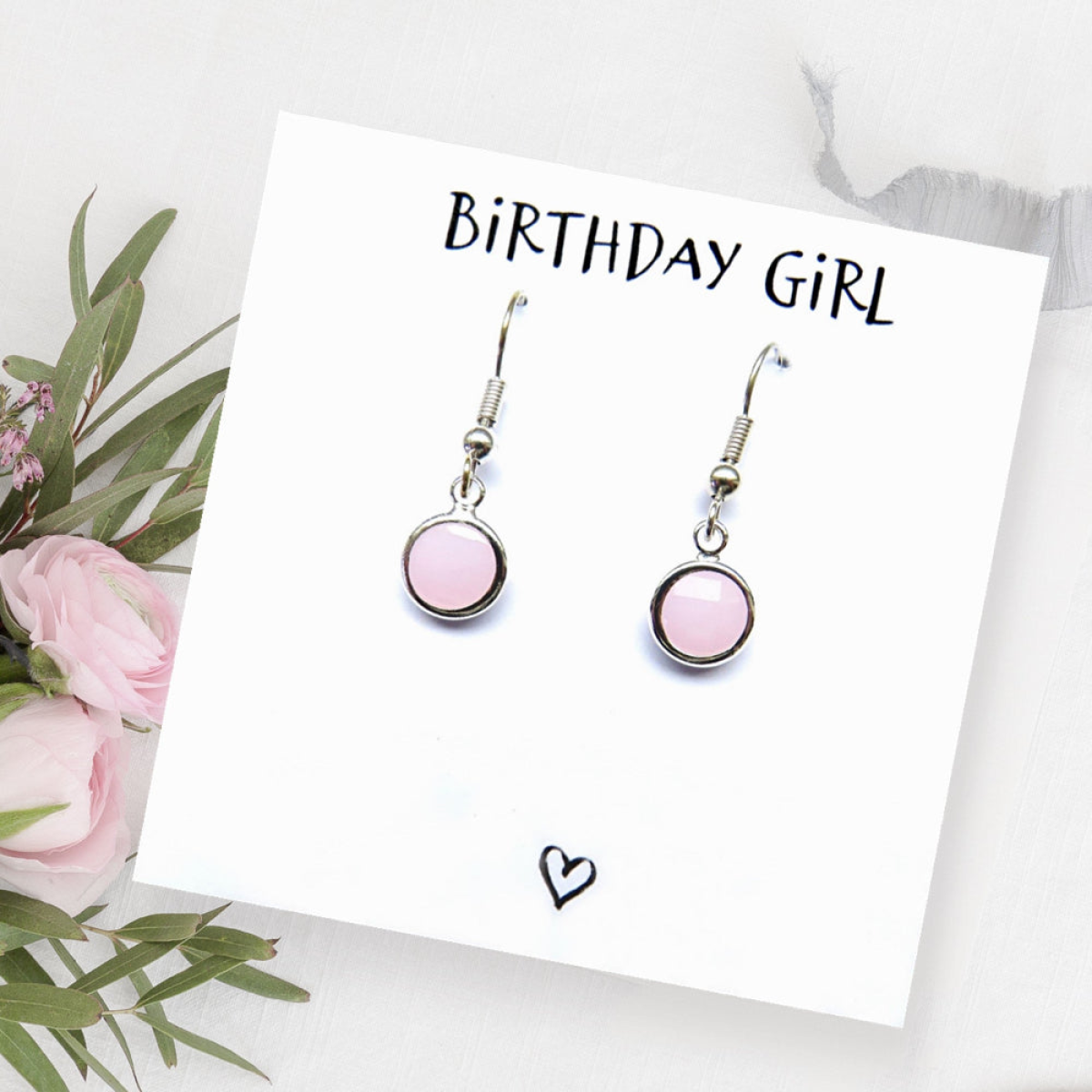 Birthday Girl card featuring pink round drop earrings with small top bead accents
