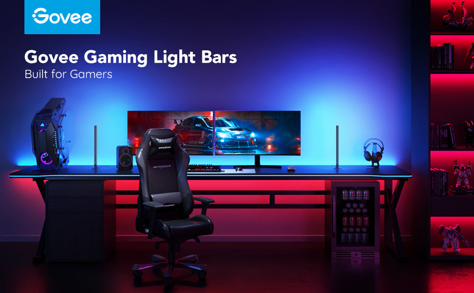 RGB gaming light bars on stands around a gaming workstation.