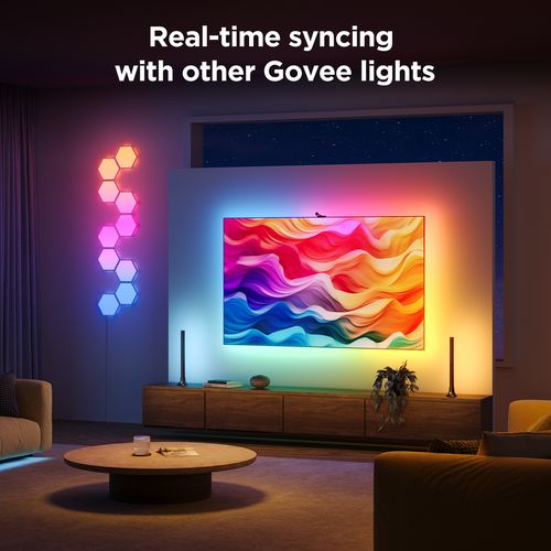 LED TV backlight creating colorful wall glow around a flat-screen TV