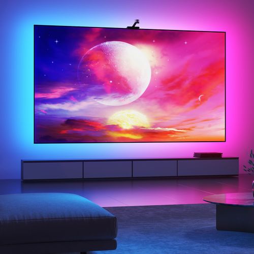LED TV backlight adding purple and blue glow behind a flat-screen TV